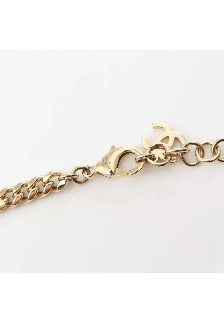 Pre-Loved Chanel choker heart logo GP Rhinestone gold clear F23B
