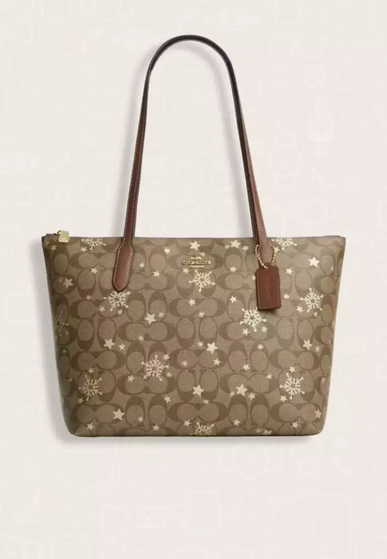 Coach Zip Top Tote In Signature Canvas With Star And Snowflake Print Khaki Saddle Gold Multi
