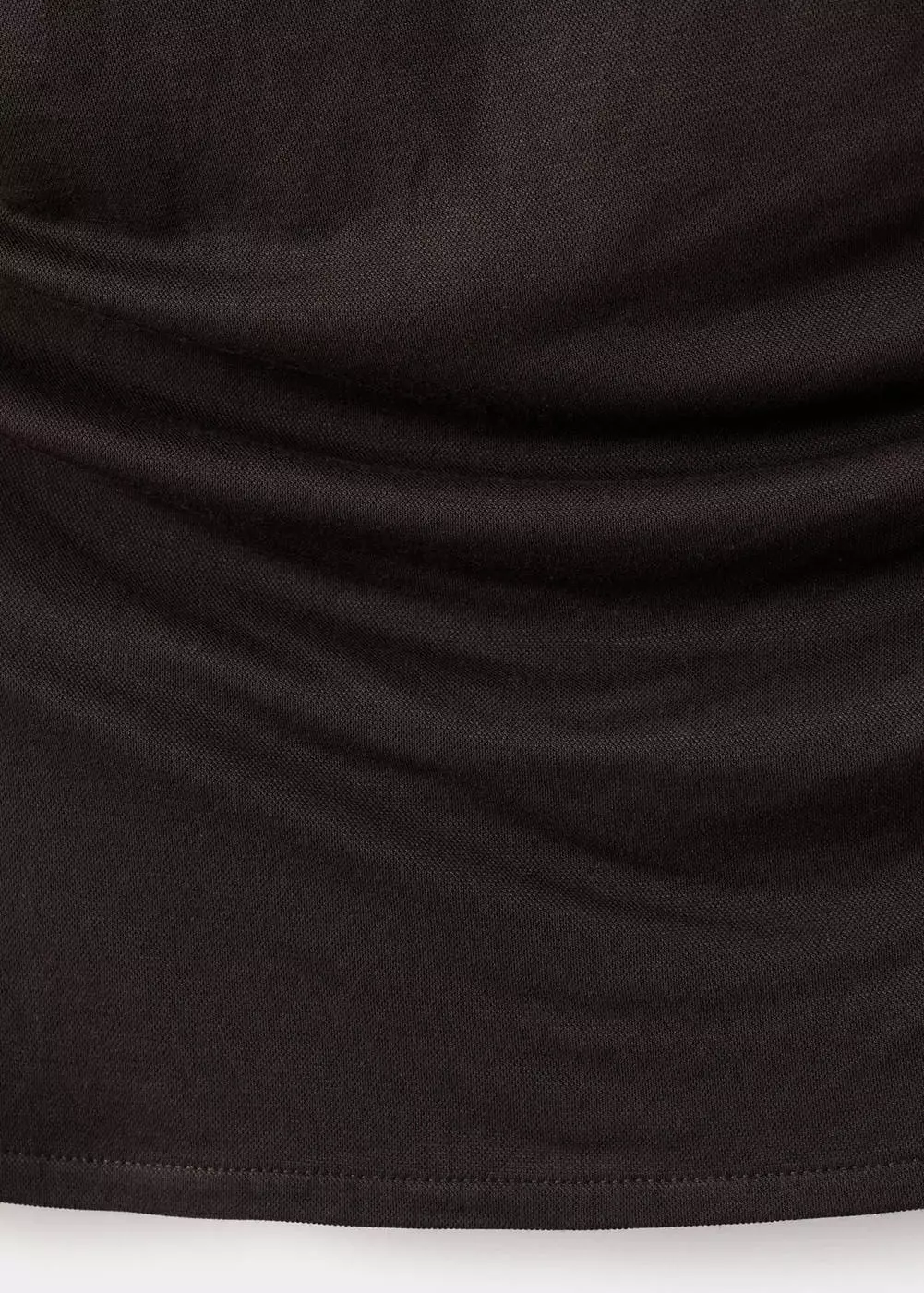 Atasan asimetris dengan kerah drape