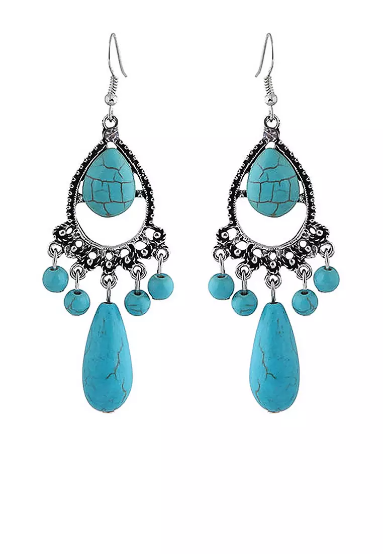 The outlier earrings top