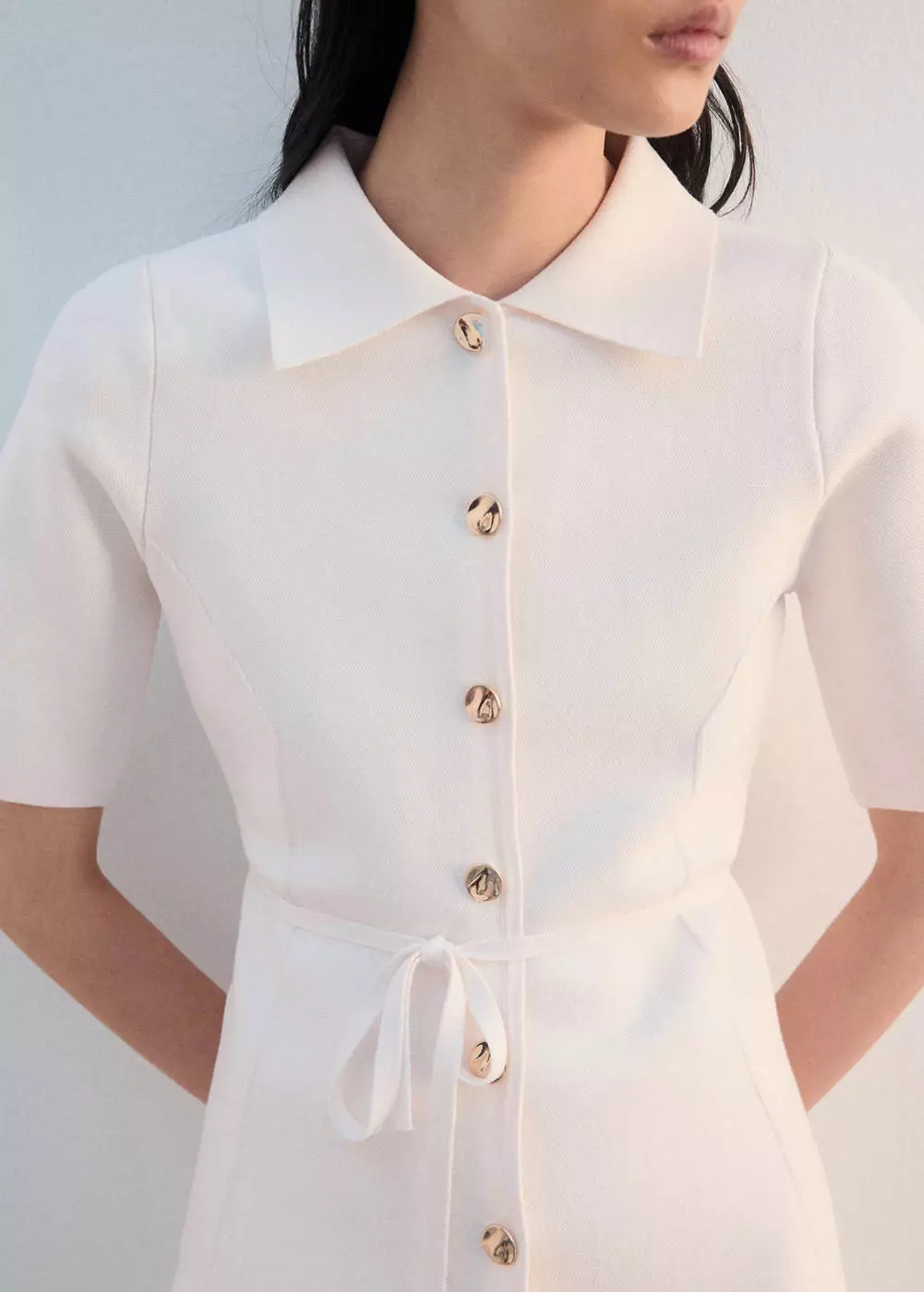 Jaket rajut dengan kerah kemeja