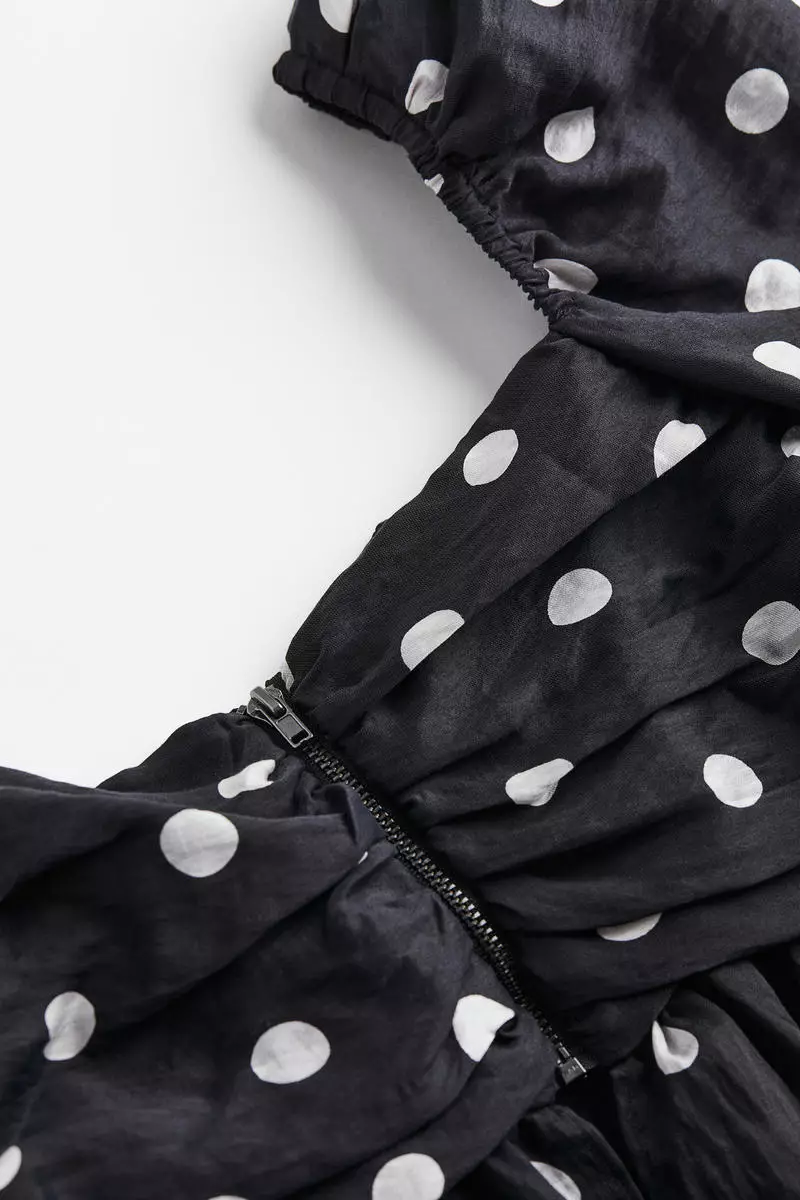 Puff-sleeved cropped peplum blouse