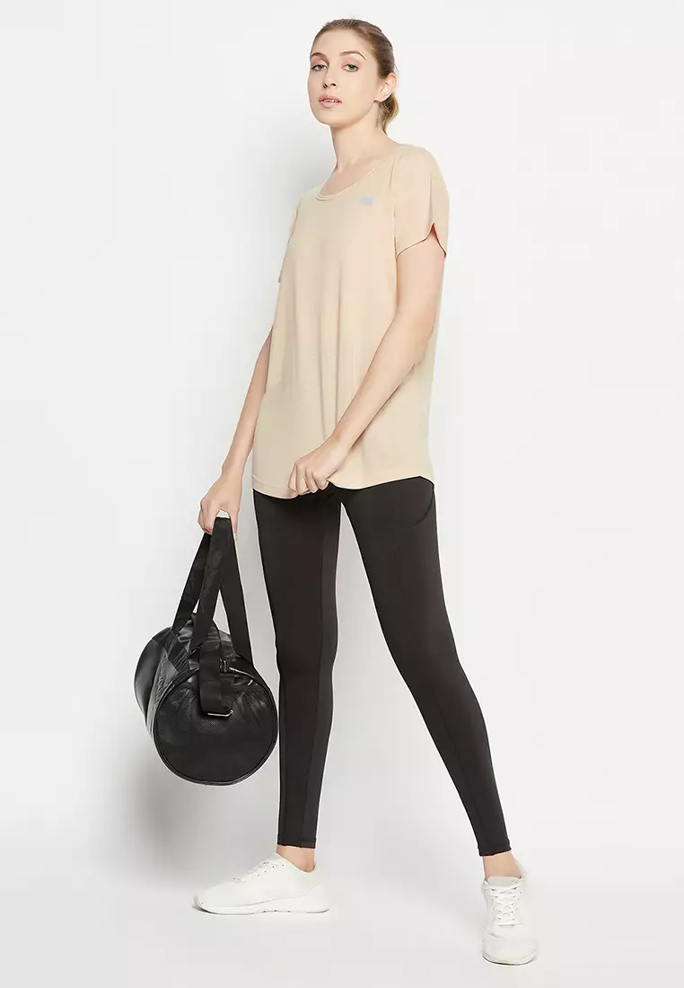 Clovia Comfort Fit Longline Active T-shirt in Cream Colour