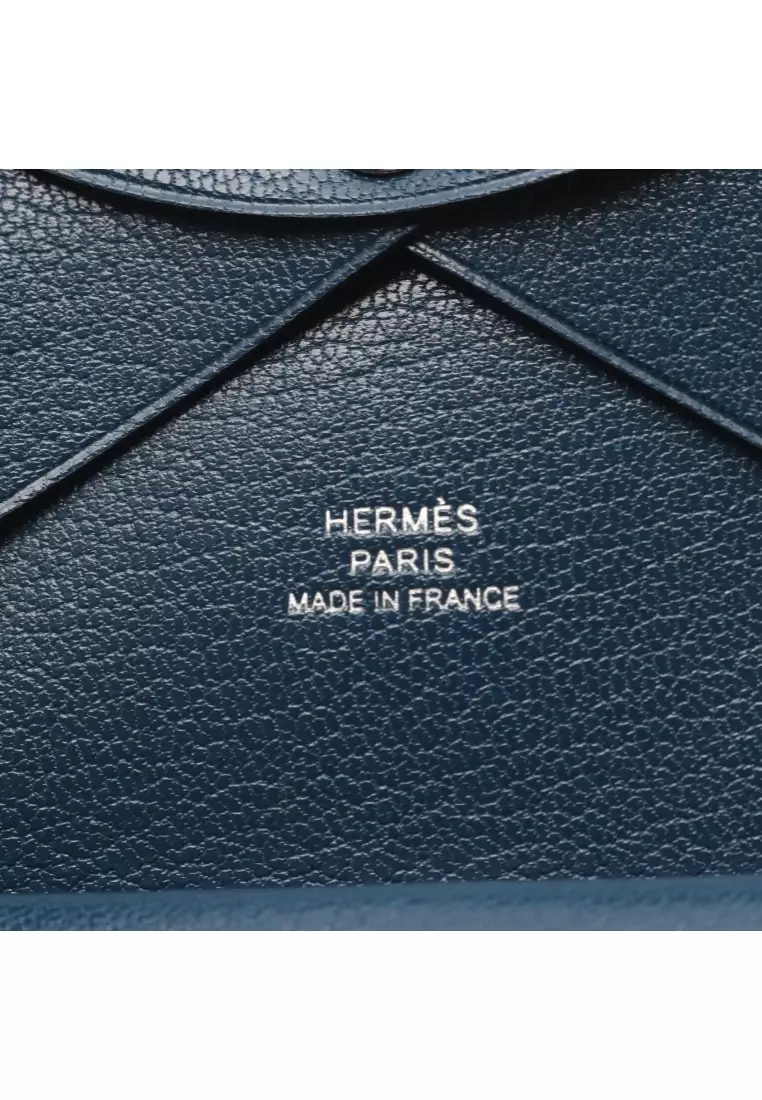 Pre-Loved Hermès Calviduo deep blue coin purse Chevre Shamquila Dark navy B stamp