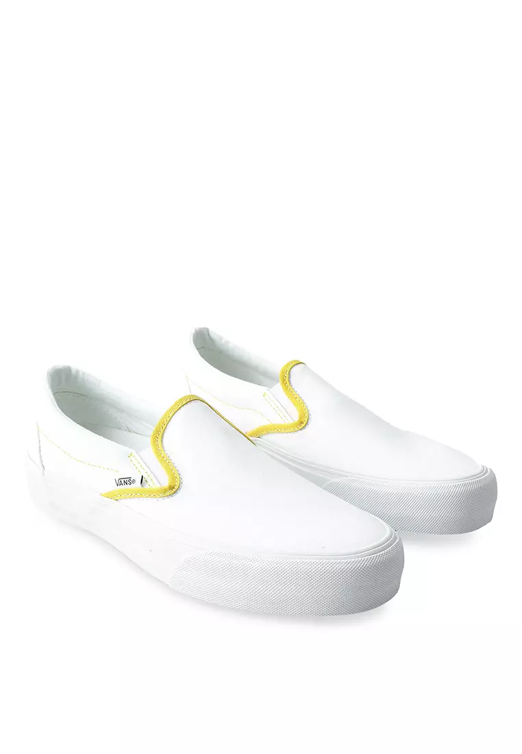 All white slip on vans womens on sale