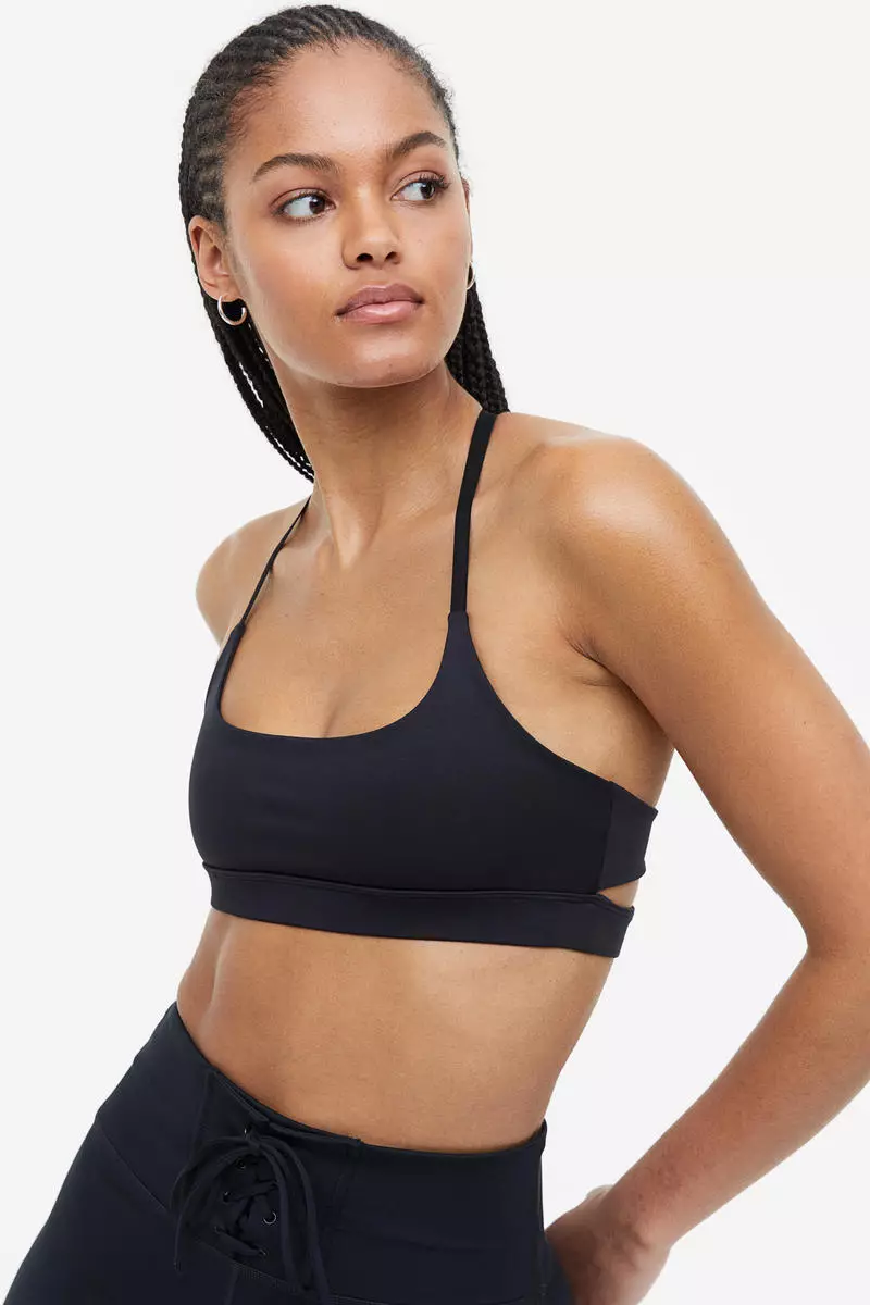 Buy H&M SoftMove™ Medium Support Sports bra in Black Dark 2024 Online