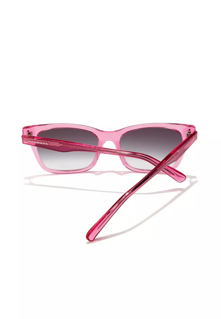 HAWKERS Pink Gradient Iron MAZE Sunglasses for Men and Women, Unisex. UV400 Protection. Official Product designed in Spain