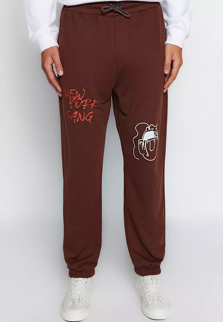 Red graphic online sweatpants