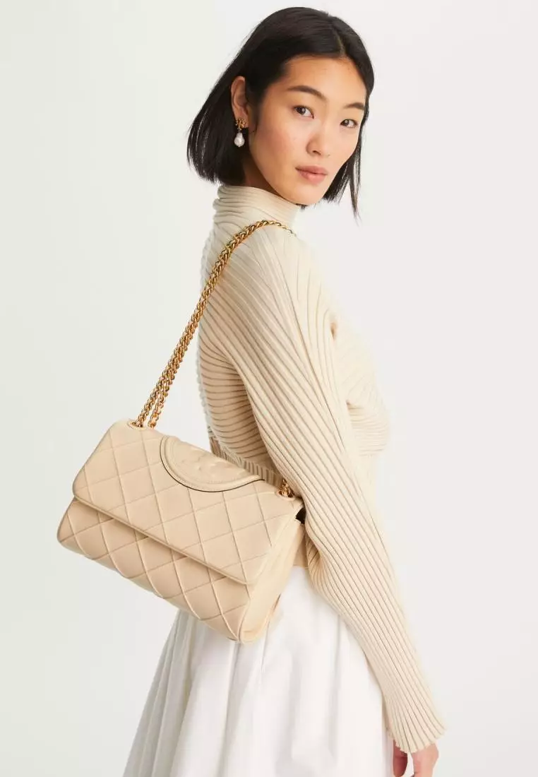 The new Fleming Soft Convertible Shoulder Bag is updated with new