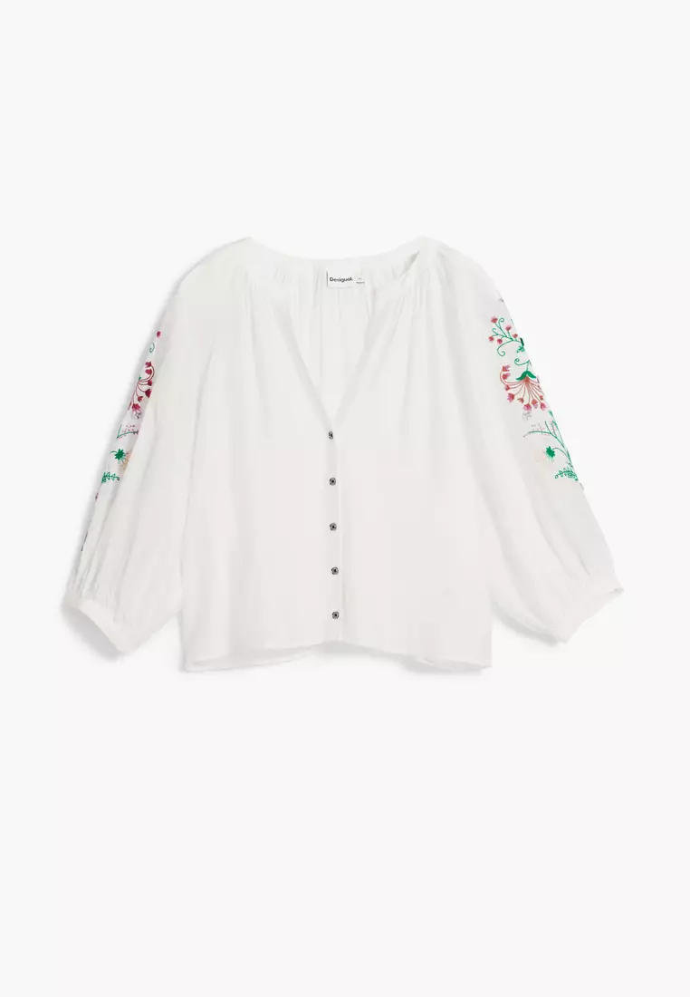 Buttoned blouse with embroidery