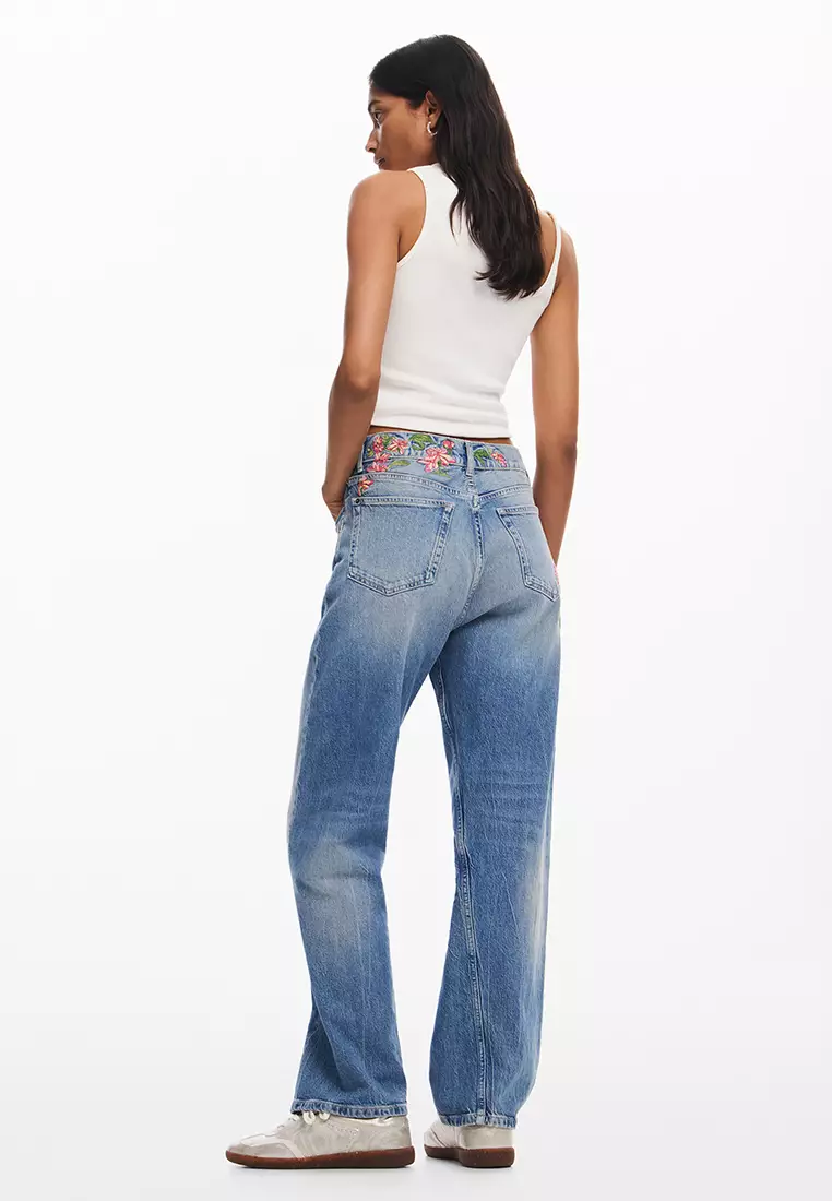 Desigual Woman Long denim pants with flowers.