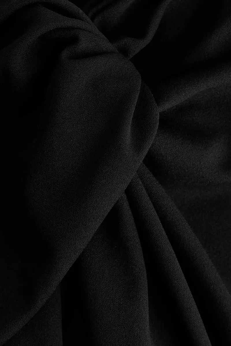 Twisted-detail trousers