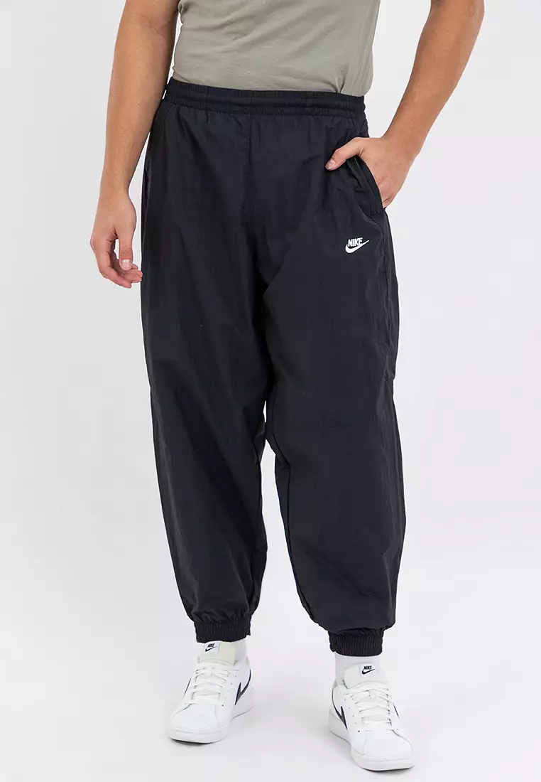 ★★Nike★★ Club Oversized Woven Track Pants M Game  W Nike Track Pants Club Woven Oversized - Czarny/Biały