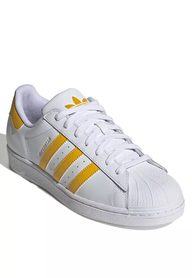 Yellow adidas superstar shoes hotsell