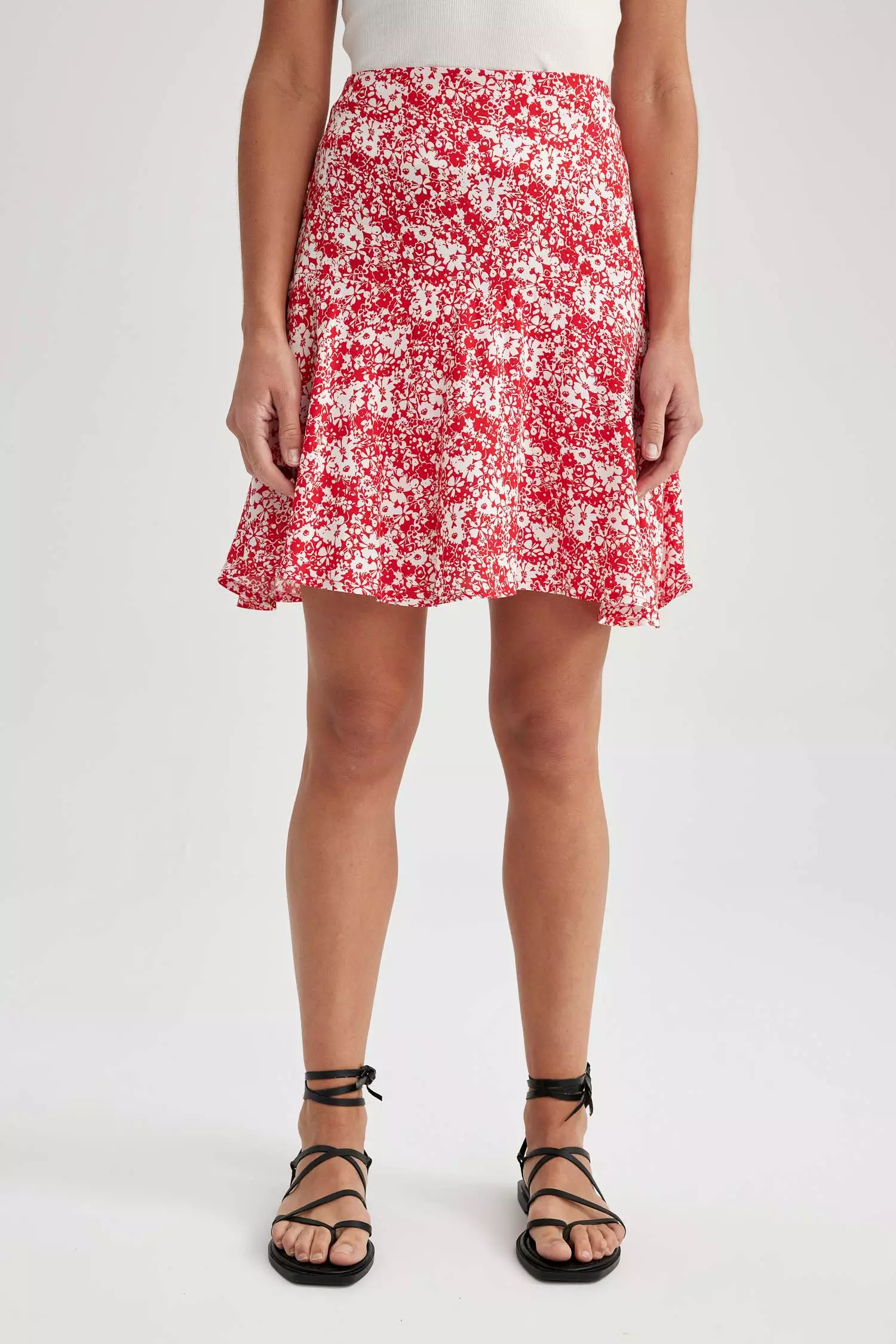 Pink mini skirt outlet with red flowers