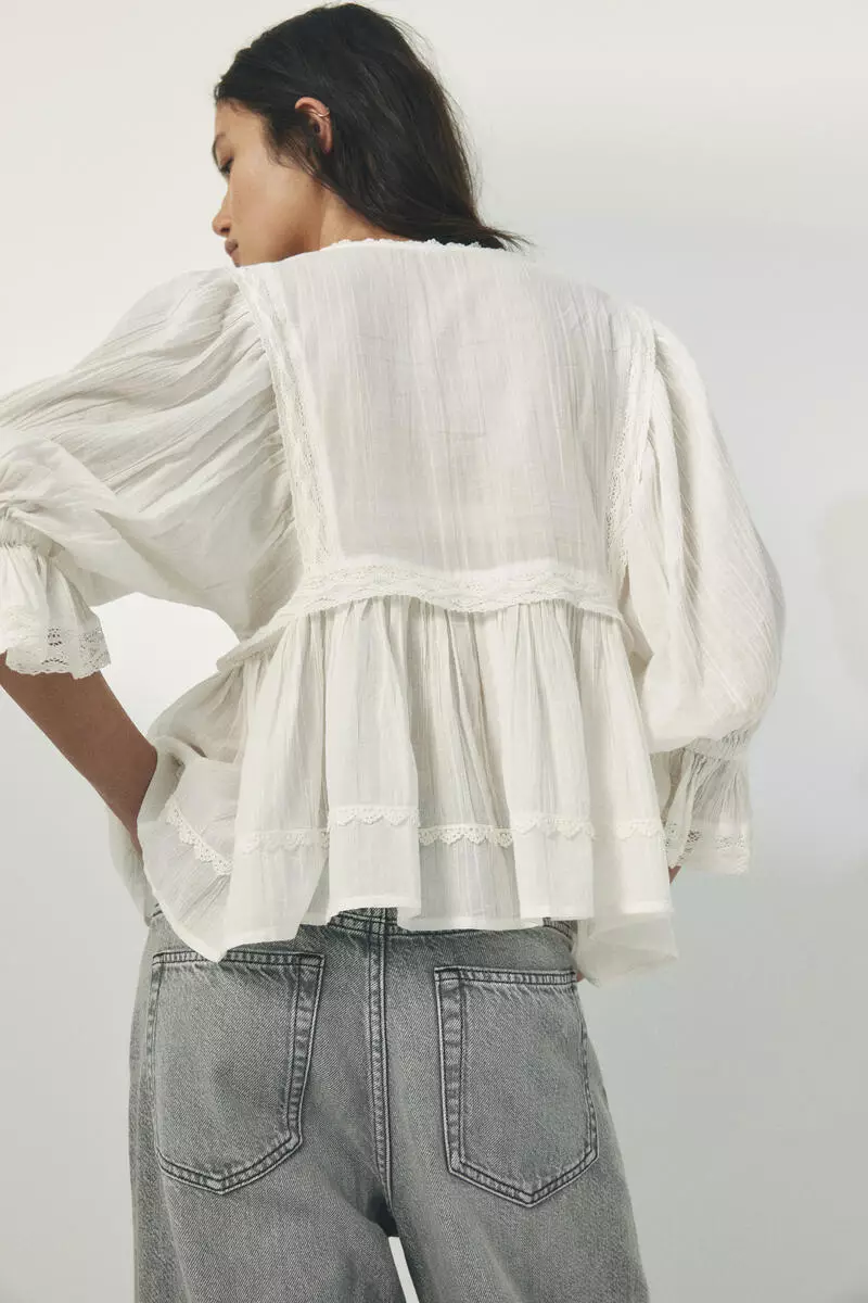 Lace-trimmed cotton blouse