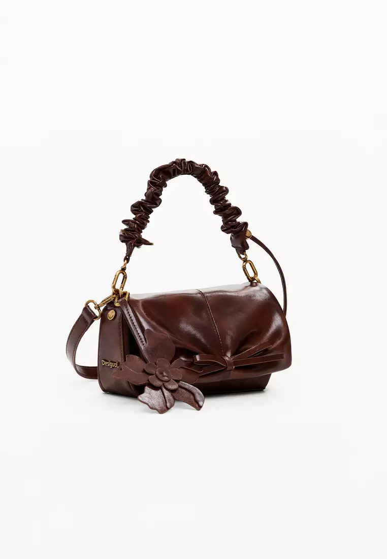 Medium shiny bow bag