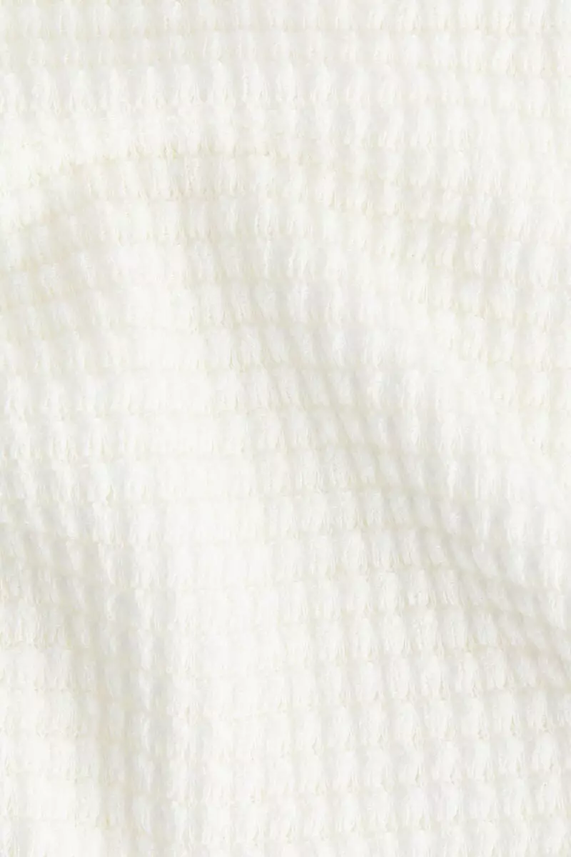 Batwing-sleeved jersey top