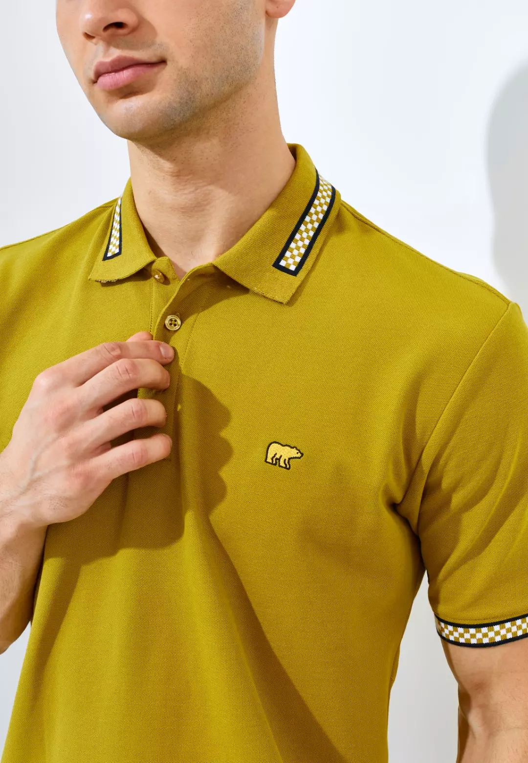 Jack Nicklaus Mustang Polo Shirt Pria Regular Fit Golden Palm