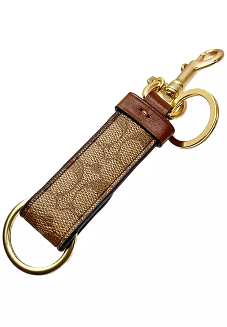 Coach Coach Trigger Snap Bag Charm In Signature Canvas in Khaki 49314