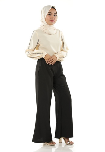 Buy Ariana Puff Sleeves Top from Ashura in Beige only 59.9