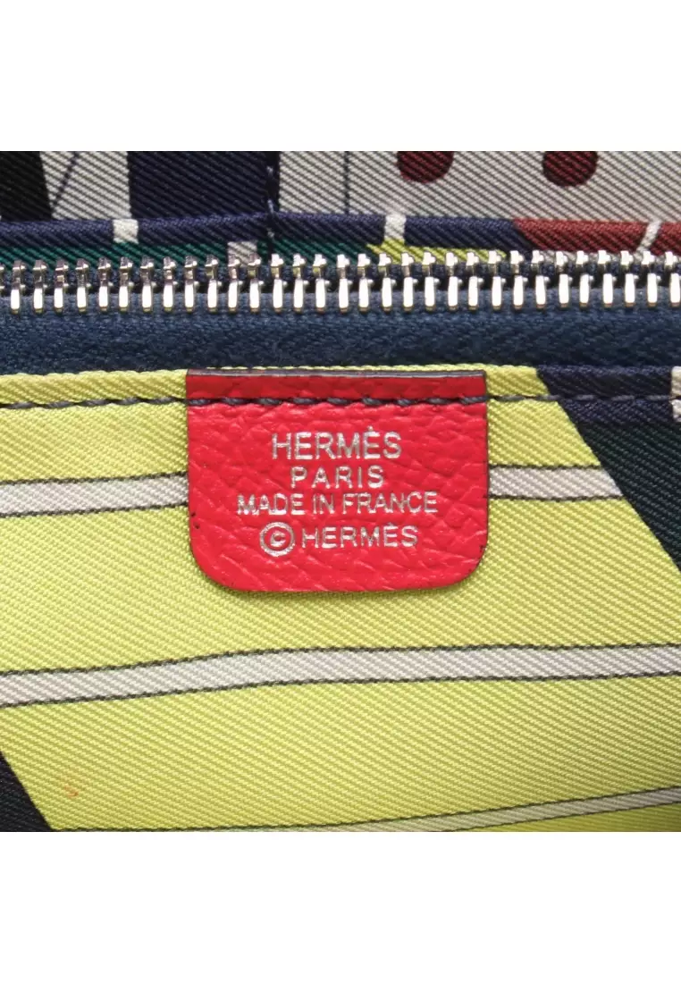 Pre-Loved Hermès Azap Long silk in rose extreme round zipper long wallet Veau epsom pink silver hardware A stamp