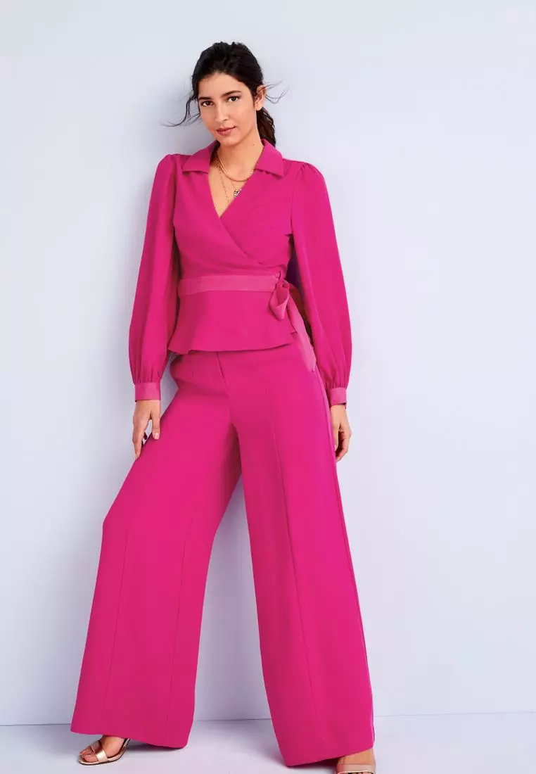 Pink trousers next store