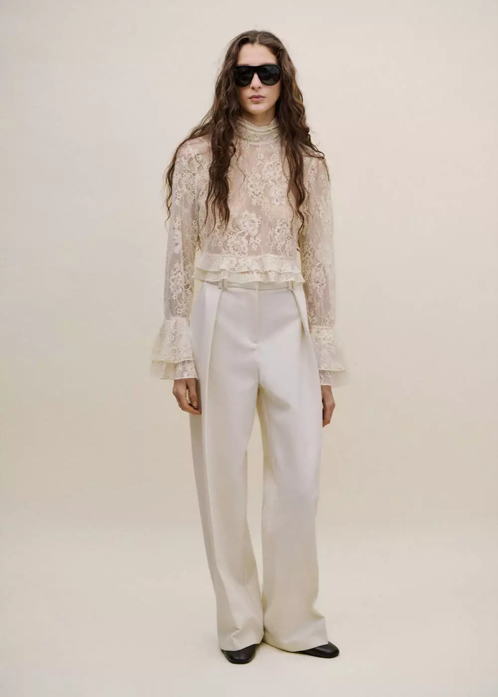 Blus bordir dengan rumbai