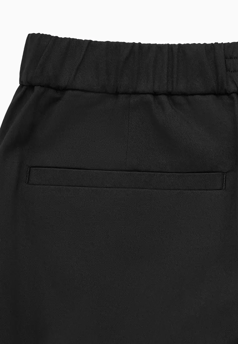 Buy COS Elasticated Tapered Twill Trousers 2024 Online | ZALORA