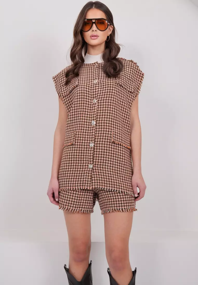 Sleeveless Tweed Jacket And Skort Set
