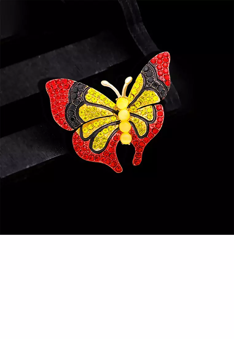 Gold butterfly pin top