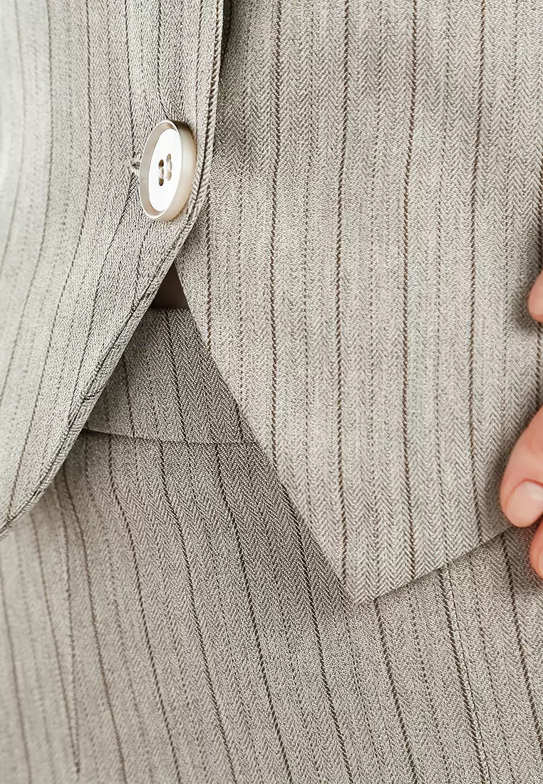 Atasan Halterneck Herringbone dalam warna Taupe