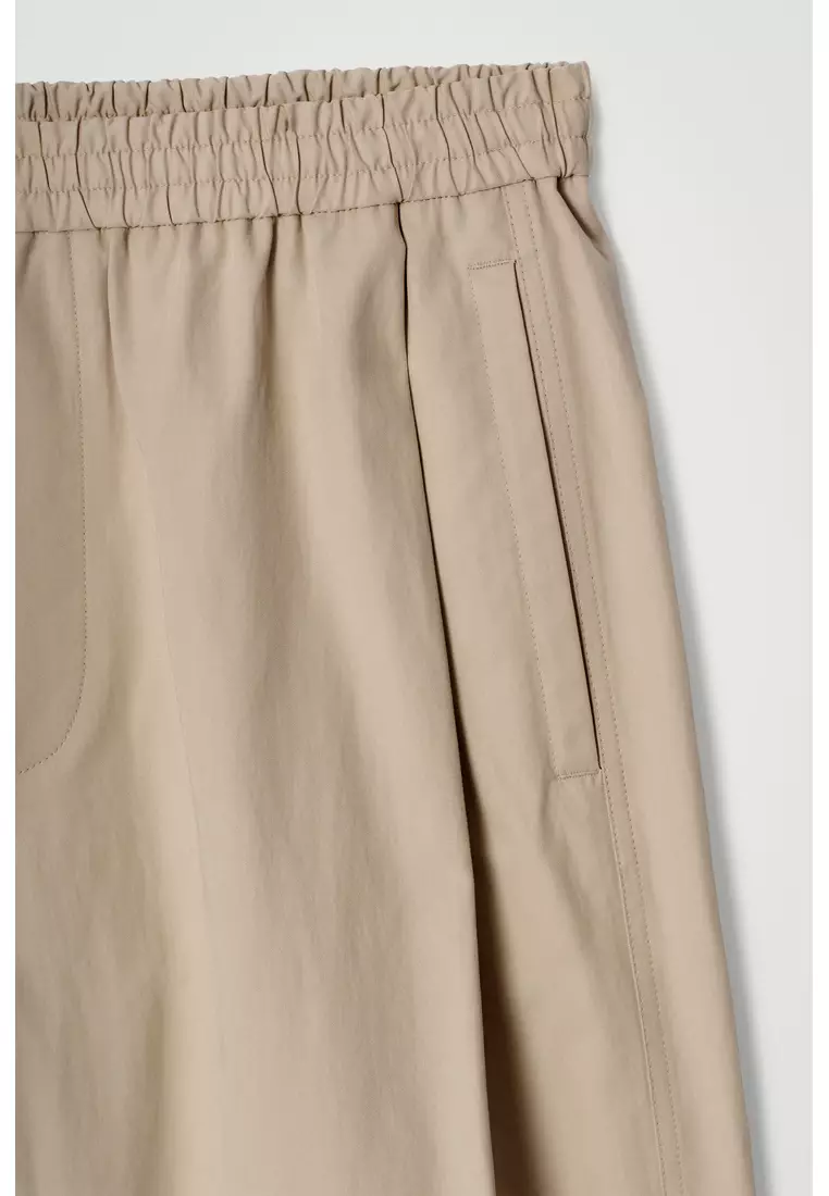 CROPPED ELASTICATED WIDE-LEG TROUSERS