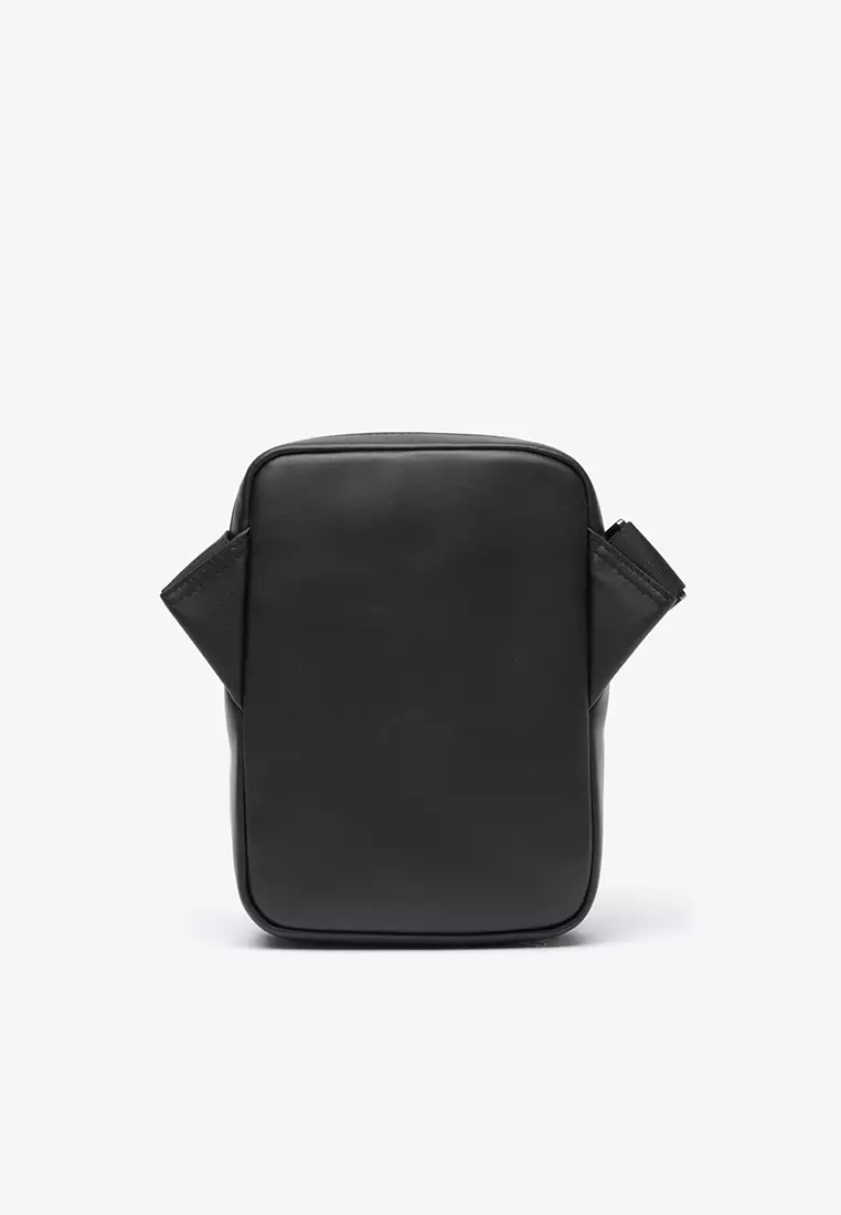 Embossed Monogram Vertical Satchel