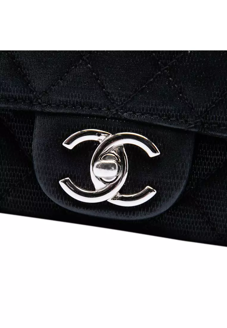 Pre-Loved Chanel Cc Quilted Iridescent Fabric East West Flap