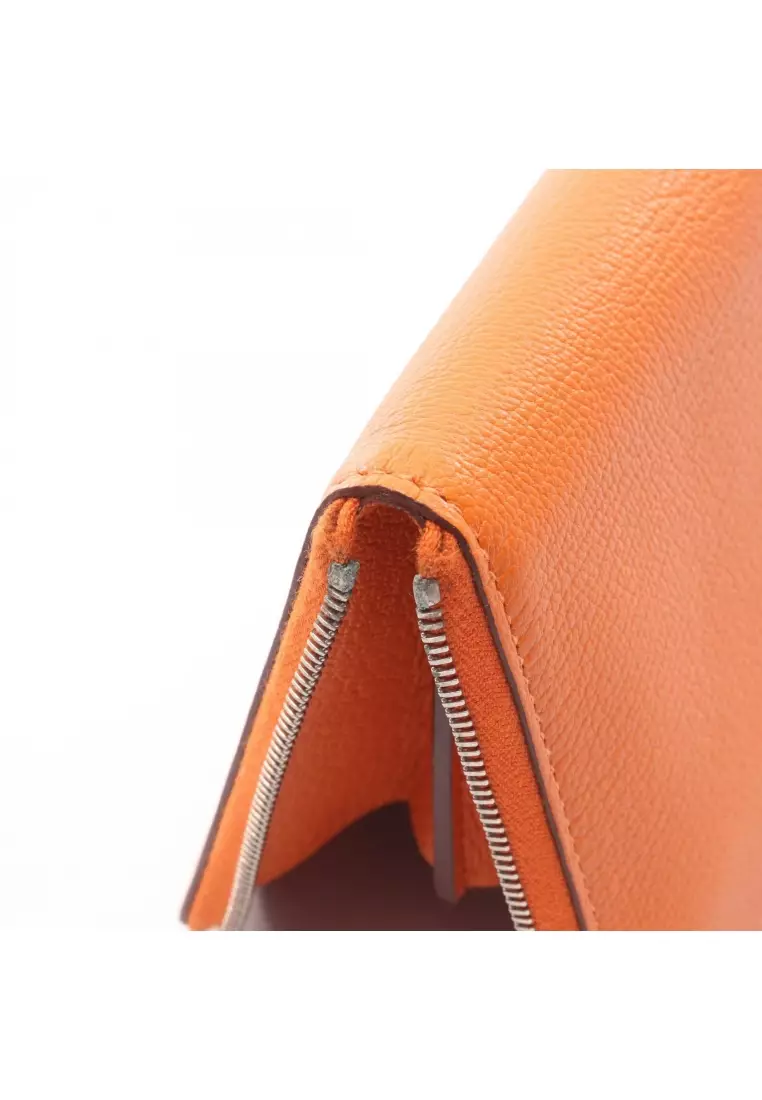 Pre-Loved Hermès Azap Long silk in Feu round zipper long wallet Chevre orange silver hardware □P stamp