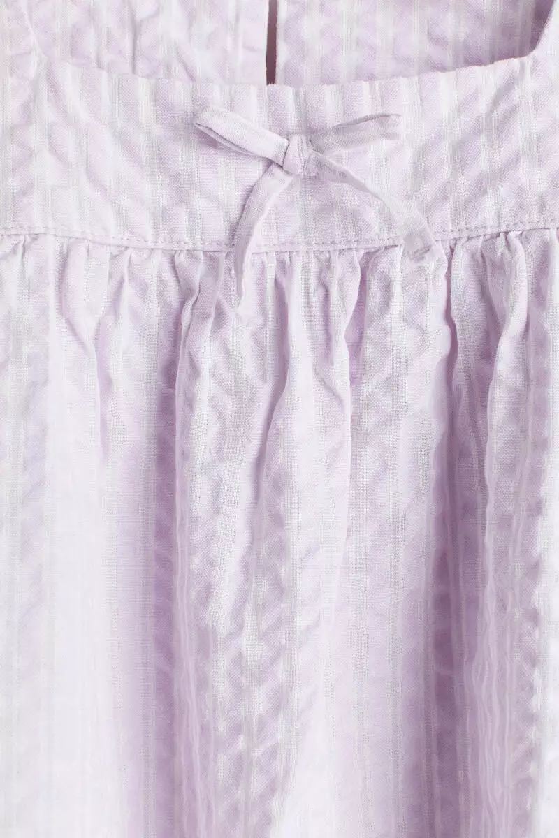 Bow-detail cotton seersucker blouse