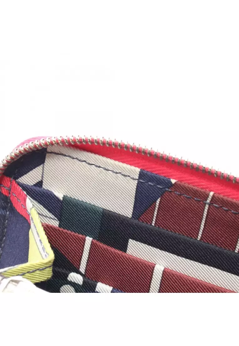 Pre-Loved Hermès Azap Long silk in rose extreme round zipper long wallet Veau epsom pink silver hardware A stamp