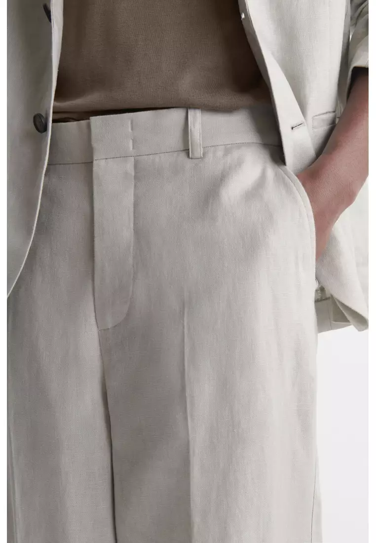 RELAXED LINEN TAPERED TROUSERS