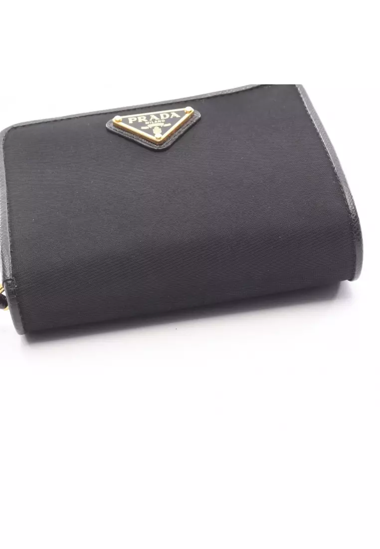 Pre-Loved Prada PORTAF PICCOLO LAMPO Bi-fold wallet nylon canvas leather black