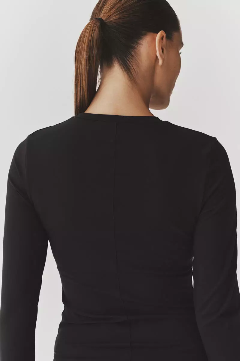 Slim Fit Long-sleeved sports top with SoftMove™