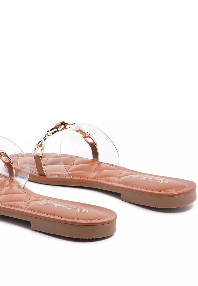 Clear Buckled Quilted Slides in Tan