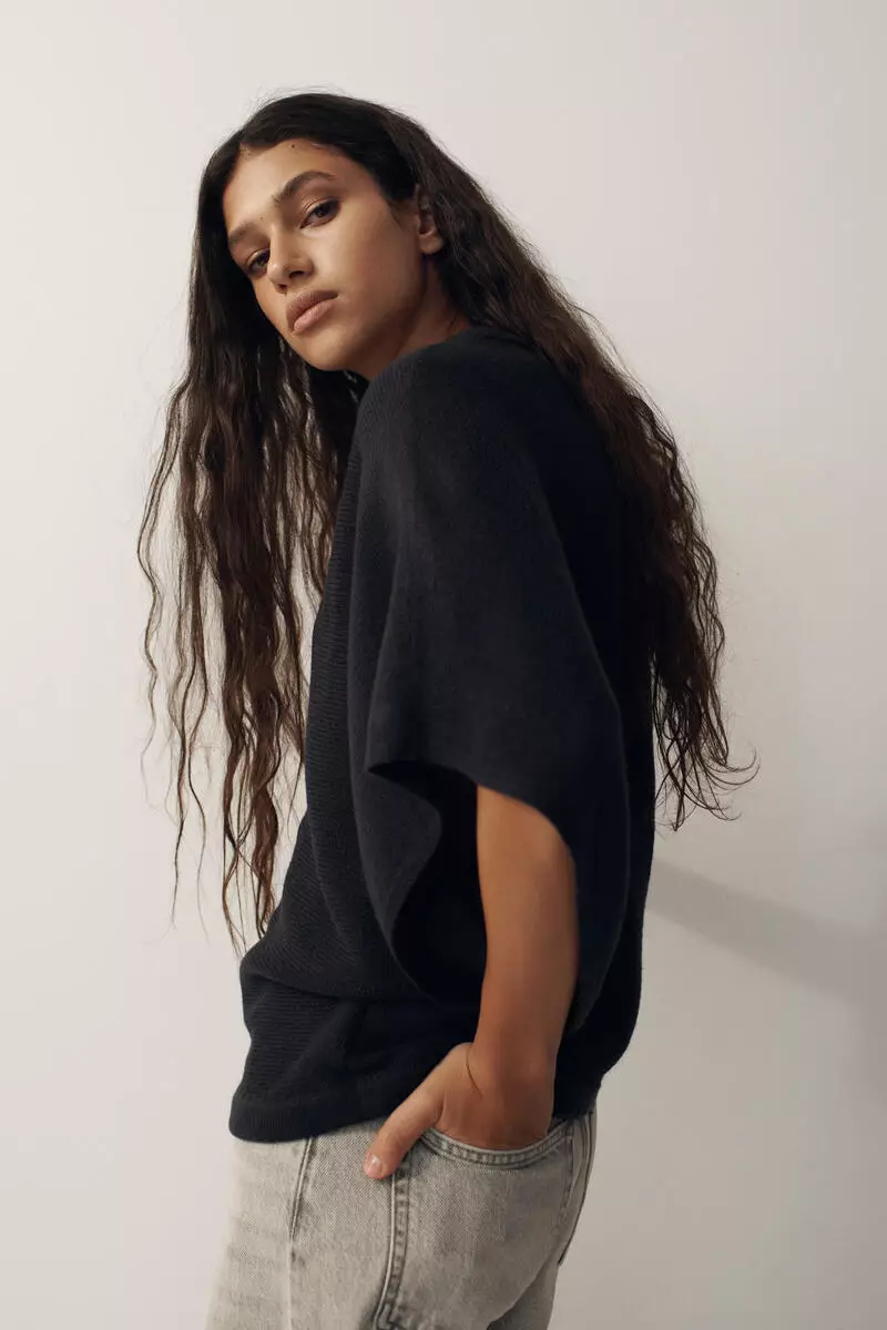 Batwing-sleeved knitted top