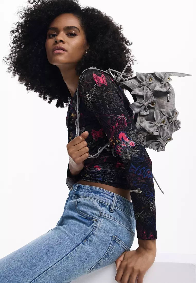 Handbag with small butterfly decoration