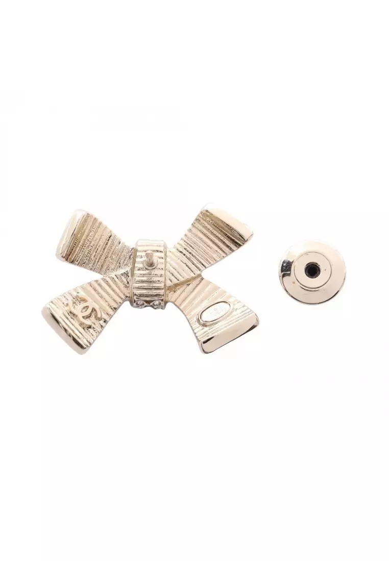 CHANEL Pre-Loved Chanel coco mark ribbon brooch GP Rhinestone gold