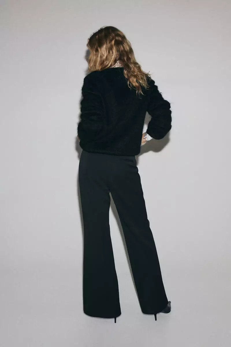 Flared belted trousers