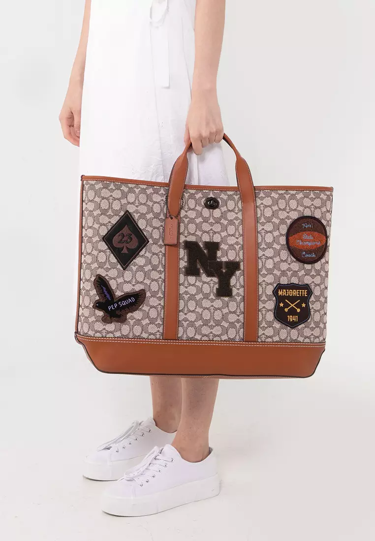 Turnlock tote in signature jacquard sales