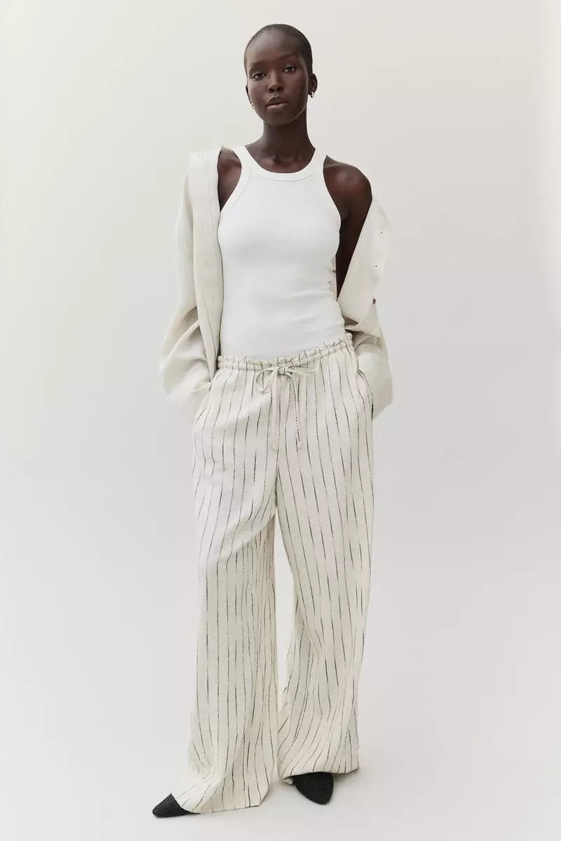 White linen blend trousers on sale