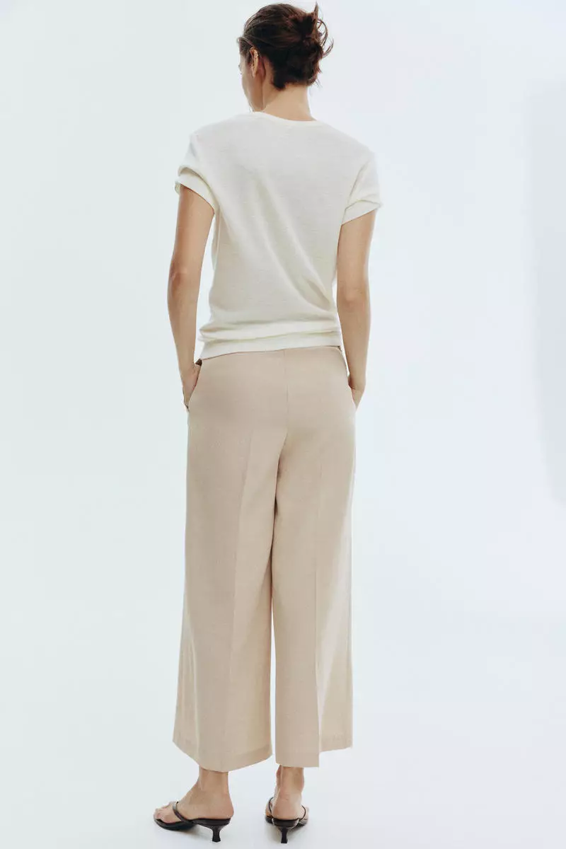 Wide ankle-length trousers