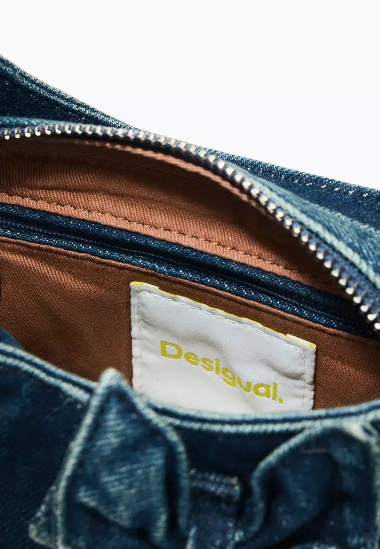 Denim bag with appliqués